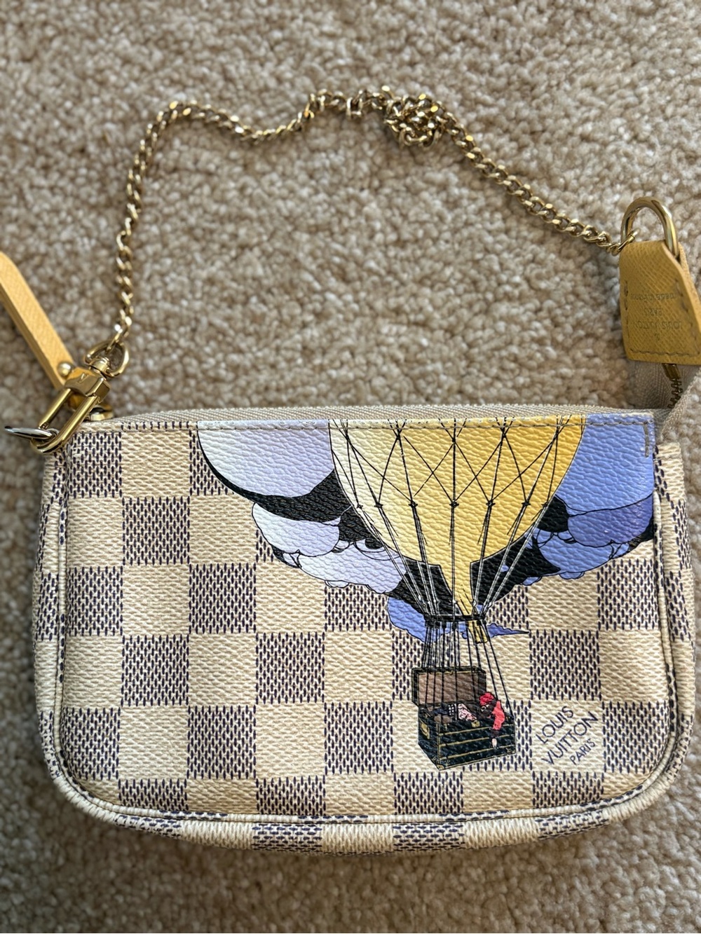 Louis Vuitton one of a kind wristlet